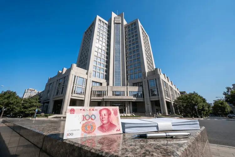 Chinas Bankkredite steigen im September stärker als erwartet